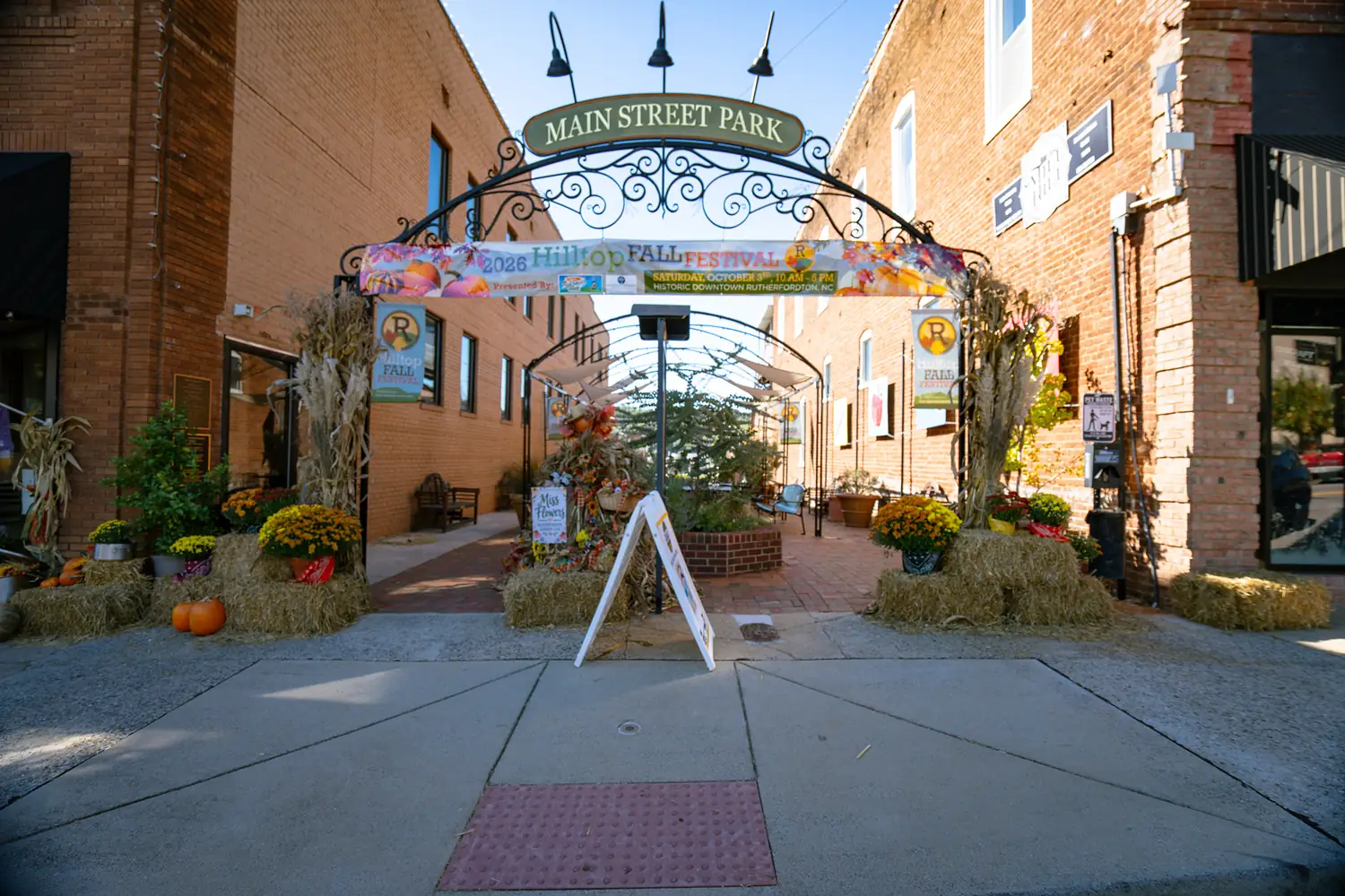 The Main Street Park arch, dressed for fall festival season